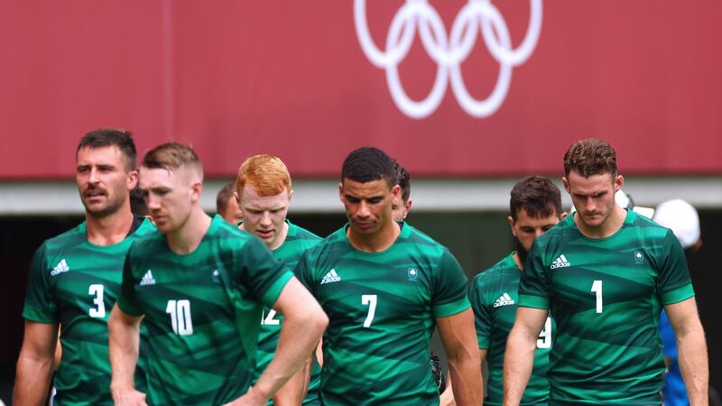 Ireland leave the pitch dejected after the win over Kenya. Photo: James Crombie/Inpho