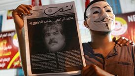 Turmoil hits Tunisia after secular politician assassinated