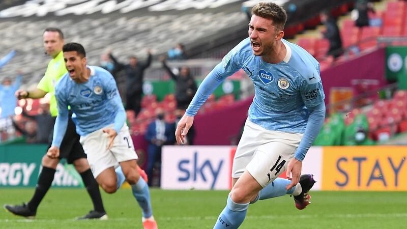 Aymeric Laporte (right) celebrates after scoring the 1-0 lead during the Carabao Cup Final between Manchester City and Spurs at Wembley. Photograph: EPA