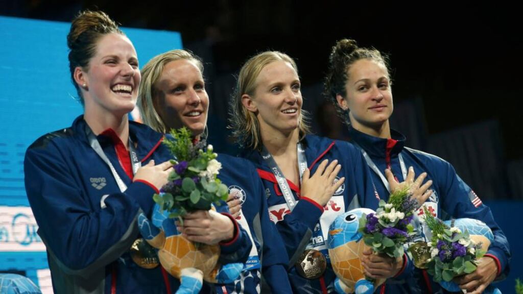 Missy Franklin (left) with US team-mates Jessica Hardy, Dana Vollmer and Megan Romano with their gold medals for the women’s 4x100m medley at the World Swimming Championships at the Sant Jordi arena, Barcelona, yesterday. Photogrph: Reuters