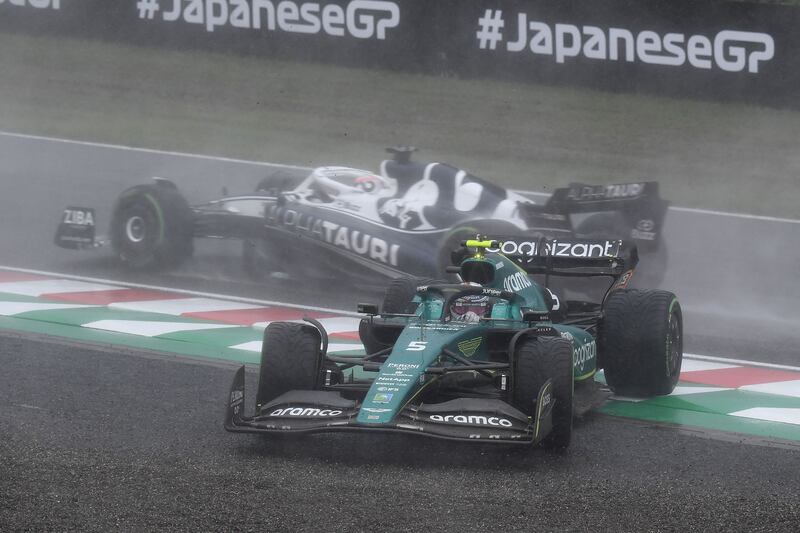 Sebastian Vettel (front) and Pierre Gasly veer off the track in the rain during the Japanese Grand Prix at Suzuka. Photograph: Toshifumi Kitamura/AFP via Getty Images