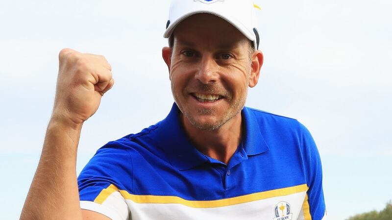 Henrik Stenson  celebrates winning his match against Bubba Watson. Photograph:   Andrew Redington/Getty Images