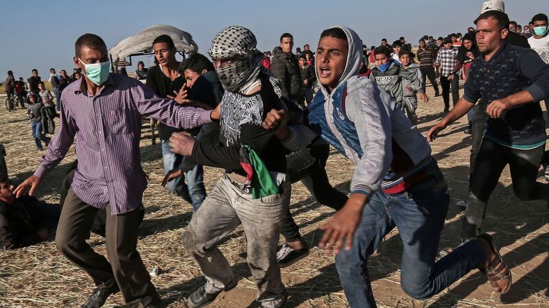 Protesters clash with Israeli security forces following a demonstration in the southern Gaza Strip in March. Photograph: Said Khatib/AFP/Getty Images