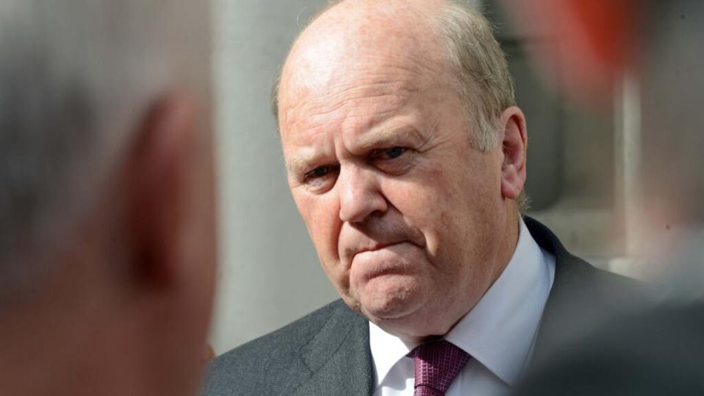 The Minister for Finance Michael Noonan, who said ahead of Moody’s decision that “before too long, there will be funds flowing from China to the Irish sovereign”. Photograph: Eric Luke / THE IRISH TIMES