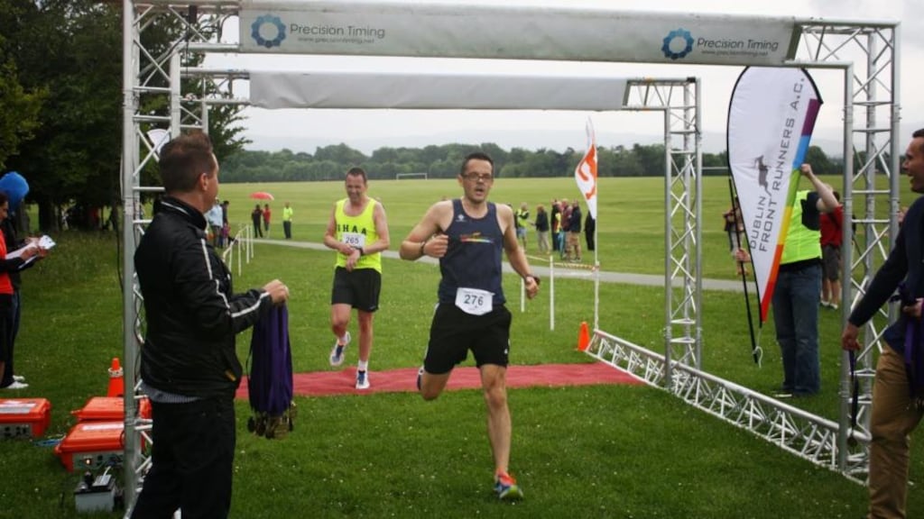 Seamus Moore finishing the Dublin Front Runners 5k Pride Run in the Phoenix Park.