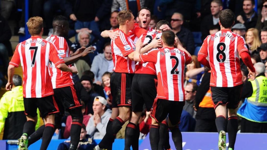 John O'Shea of Sunderland celebrates the own goal scored by Cesar Azpilicueta of Chelsea with team mates during the Barclays Premier League match between Chelsea and Sunderland at Stamford Bridge on April 7th. Photograph: Mike Hewitt/Getty Images