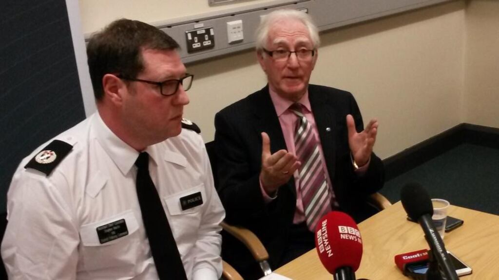 PSNI Assistant Chief Constable Stephen Martin and Honorary Polish consul Jerome Mullen during a press conference at PSNI’s Musgrave Street station in Belfast after the latest in a spate of hate crimes targeting the Polish community. Photograph: PA