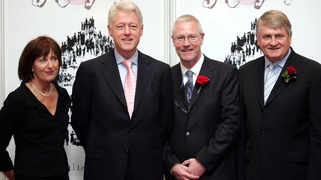 Former US president Bill Clinton on a visit to Dublin in 2005 with  Mary Donohoe, founder of The Rose Project, her husband Denis Donohue, and businessman Denis O’Brien, at a fundraising breakfast for The Rose Project-Aids in Africa. Photograph: Eric Luke/The Irish Times