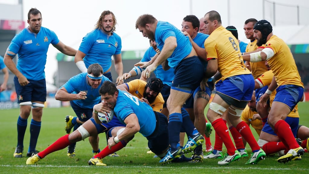 Alessandro Zanni lunges to score for Italy during their closing Pool D win over Romania. Photograph: Reuters