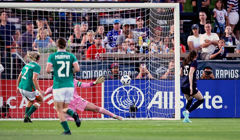 USA’s Rose Lavelle scores her side’s third goal of the game past Courtney Brosnan. Photograph: Ryan Byrne/Inpho