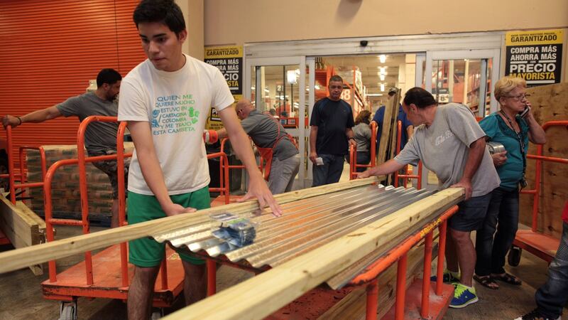 People buy material at a hardware store after Puerto Rico Governor Ricardo Rossello declared a state of emergency in preparation for Hurricane Irma. Photograph: Reuters