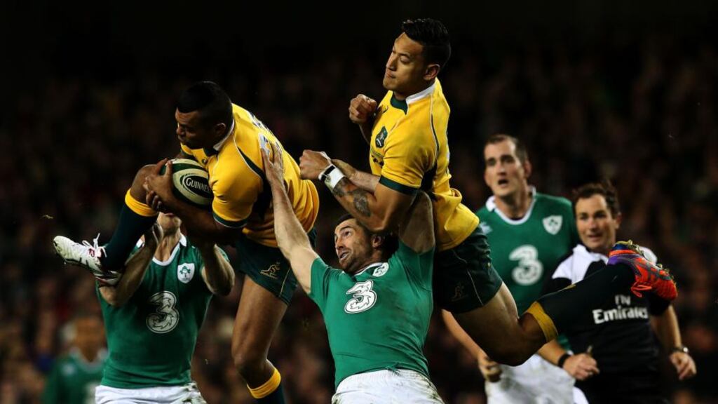 The physicality of the collisions in international rugby is breathtaking but so too the athletic prowess, as demonstrated here by Australia’s Kurtley Beale, who beats team-mate Israel Folau and Ireland’s Rob Kearney to the ball at the Aviva Stadium. Photograph: Brian Lawless/PA Wire.