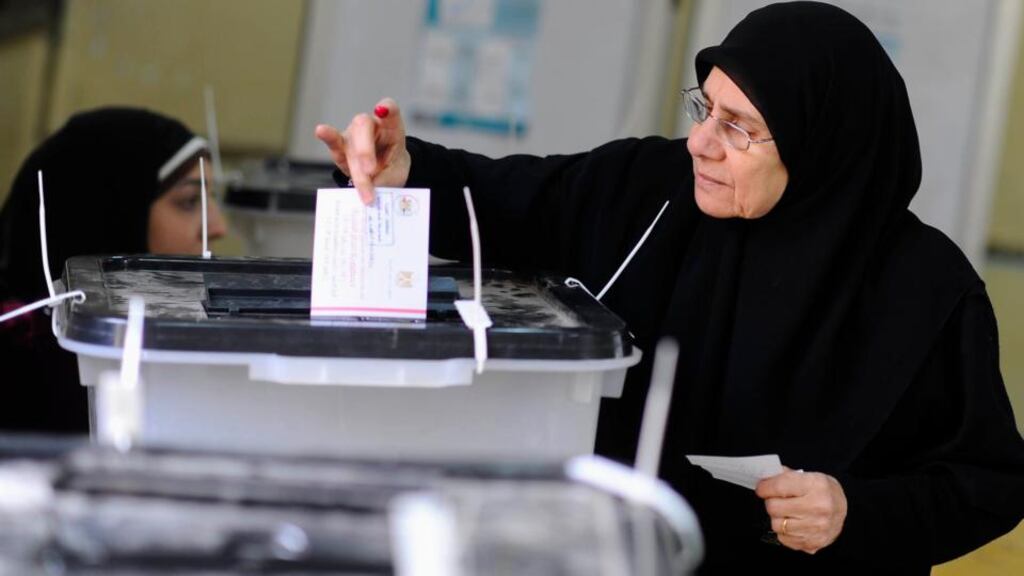 A woman casts her vote at a polling centre during a referendum on Egypt’s new constitution in Cairo. Photograph: Mohamed Abd El Ghany / Reuters