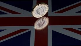Sterling drops after poll showing risk of hung parliament