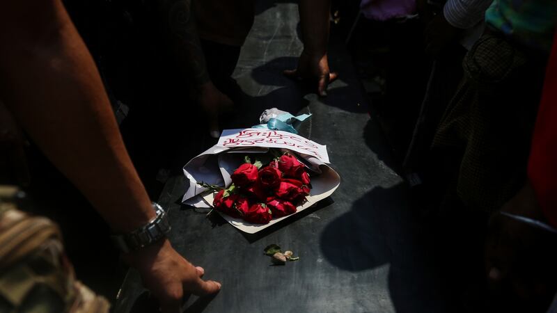 Flowers lay on the coffin of Ma Kyal Sin during her funeral in Mandalay on Thursday. Photograph: Kaung Zaw Hein/EPA