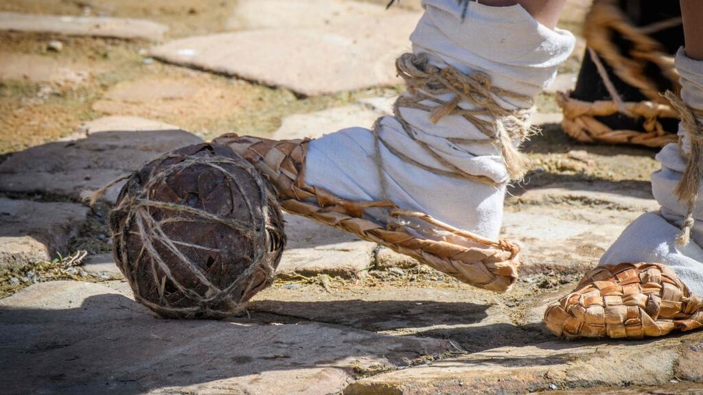 Image of the week: A performer in the Russian World Cup host city of Saransk uses traditional bast shoes to show photographers how football would once have been played. Photograph: Mladen Antonov / AFP / Getty