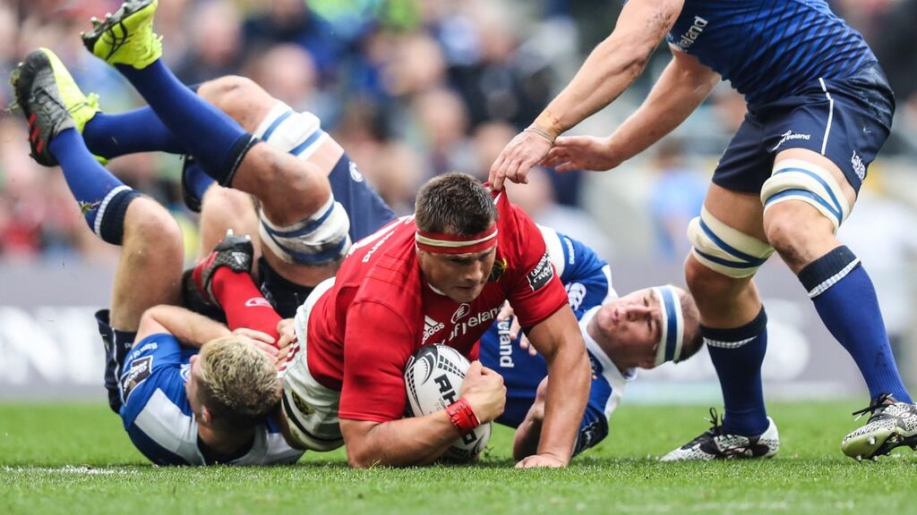 Munster’s CJ Stander was tackled early and often by the Leinster defence. Photo: Billy Stickland/Inpho