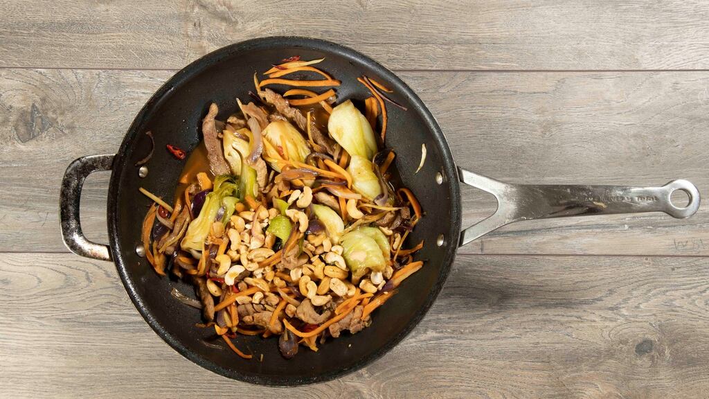 Stir-fried chicken with sweet potato, pak choi and cashews. Photograph: Patrick Browne