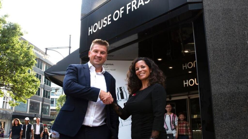 James Keany of CBRE and Eleanor Dalley, general manager of House of Fraser’s Oxford Street store, following the announcement that CBRE had agreed terms for the retailer to remain in the flagship London store. Photograph: CBRE/PA