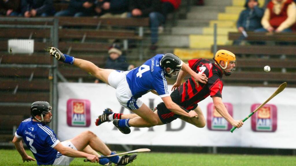 Ballygunner’s Brian O’Sullivan is fouled by David Ryan of Cratloe during their Munster club hurling championship match at Walsh Park. Photograph: Inpho