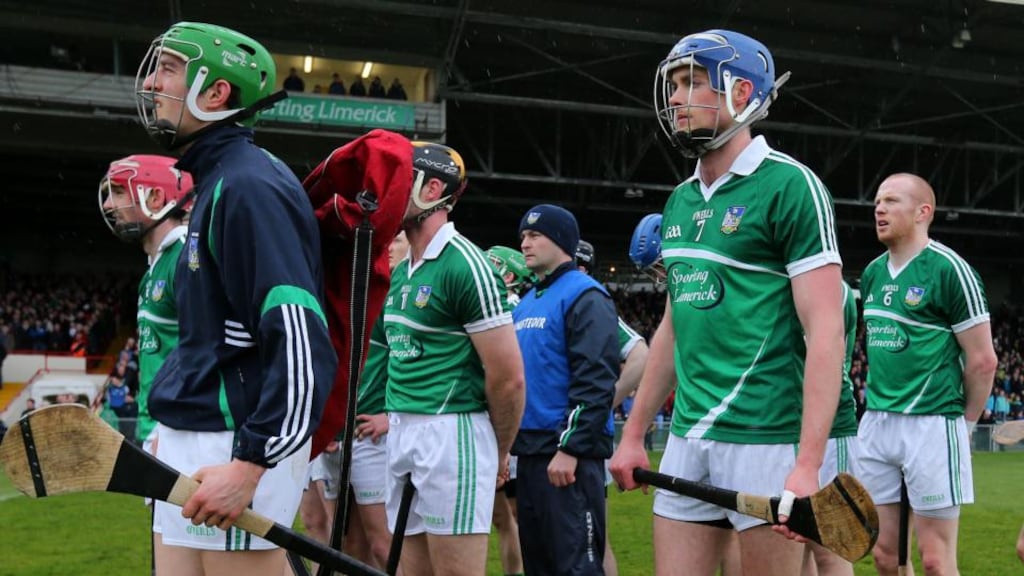 Manager TJ Ryan and the Limerick players stand together for the national anthe.