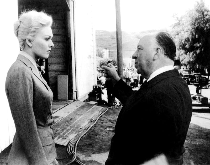 Kim Novak with British director and producer Alfred Hitchcock on the set of his movie Vertigo. Photograph: Sunset Boulevard/Corbis via Getty Images
