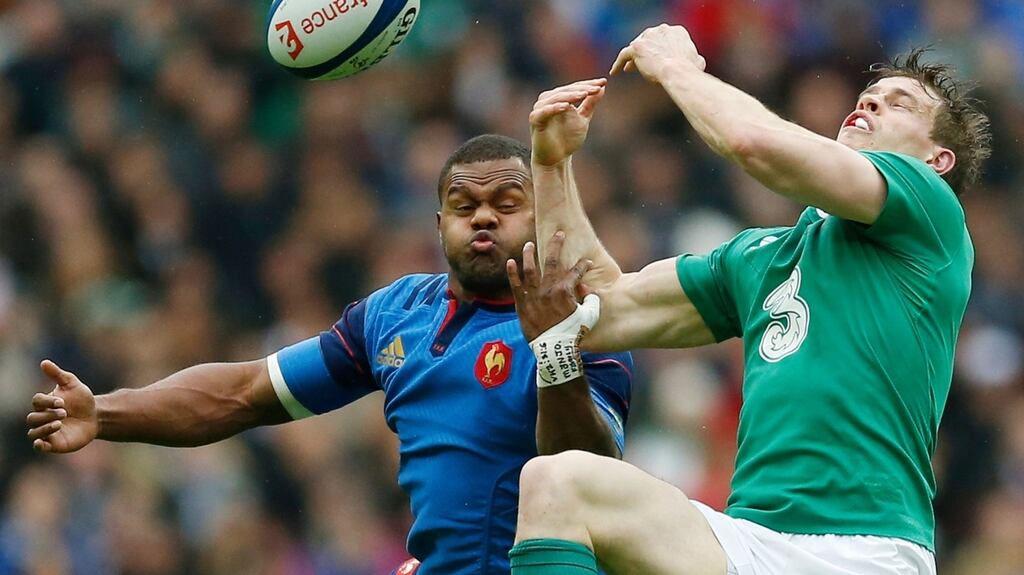 France’s Virimi Vakatawa and Ireland’s Andrew Trimble compete for the ball during their Six Nations clash in Paris. Photograph: Andrew Boyers/Reuters