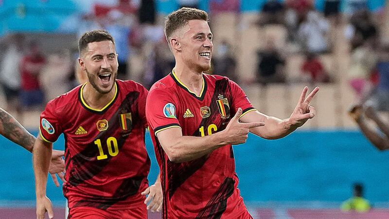 Thorgan Hazard celebrates with brother Eden after his goal against Portugal. Photograph: Thanassis Stavrakis/Getty/AFP