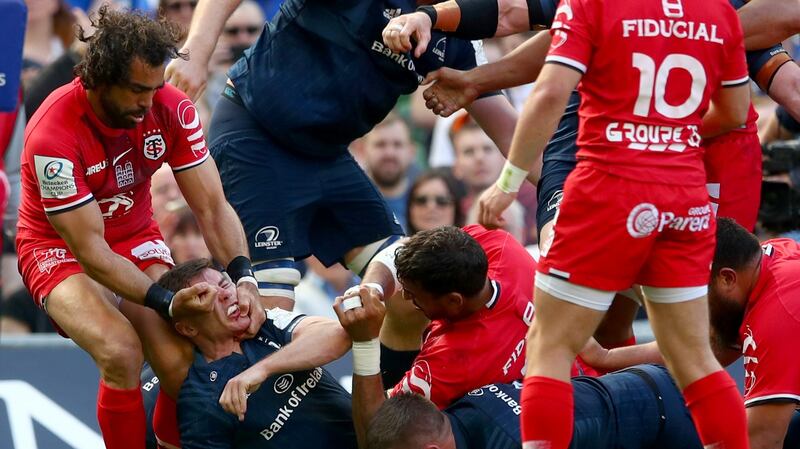 Leinster’s Luke McGrath scores a try despite a challenge from Toulouse’s Yoann Huget in the Champions Cup semi-final in 2019 at the Aviva. Photograph: James Crombie/Inpho