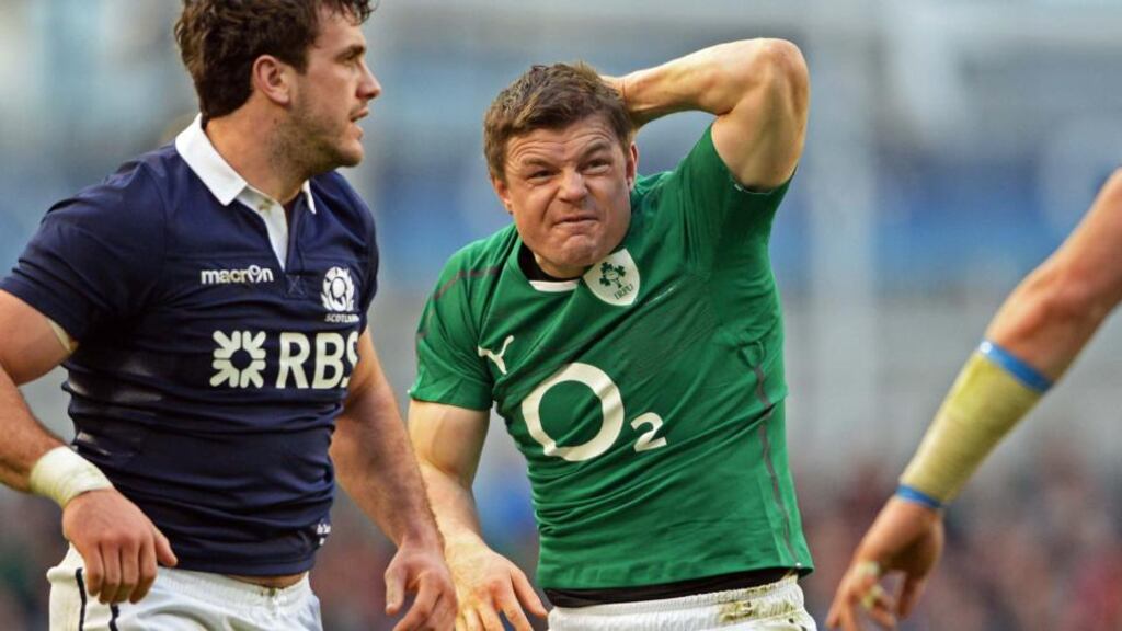 Ireland’s Brian O’Driscoll grimaces after receiving a knock to the head during the Six Nations game against Scotland at the Aviva Stadium yesterday. Photo: Eric Luke