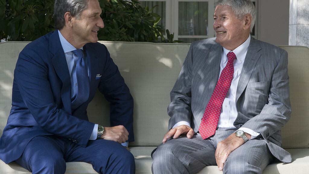 Liberty Global chief executive Mike Fries (L) chats to the company’s founder, John Malone, in Dublin last month. Photograph: Dave Meehan