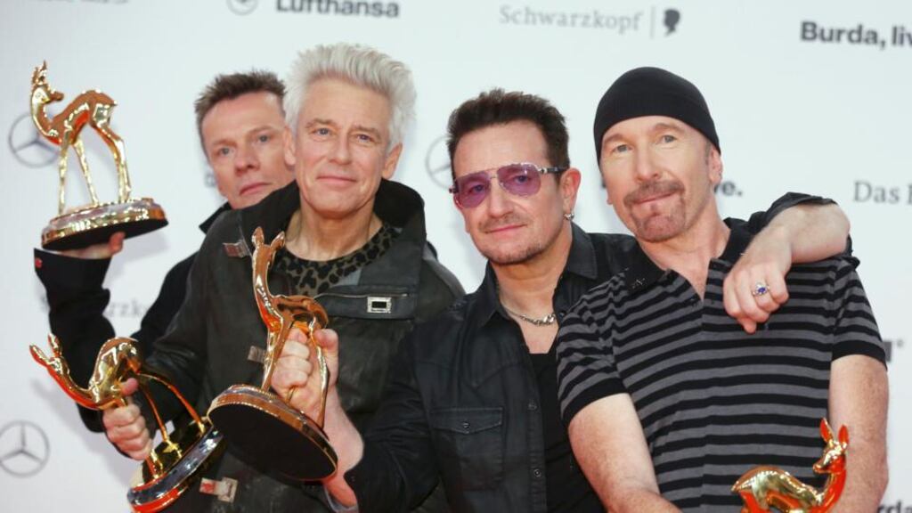 U2 have announced details of a new tour which will include at least one concert in Dublin. In this file image above, (from left) Larry Mullen, Adam Clayton, Bono and the Edge are seen with their  Music International trophies during the Bambi 2014 media awards ceremony in Berlin last month.