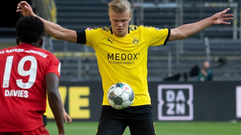 Erling Braut Haaland controls the ball during Borussia Dortmund’s defeat to Bayern. Photograph: Federico Gambarini/Getty/AFP