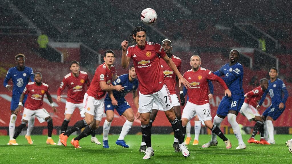 Edison Cavani heads the ball on hie Manchester United debut. Photograph: Michael Regan/Getty/AFP