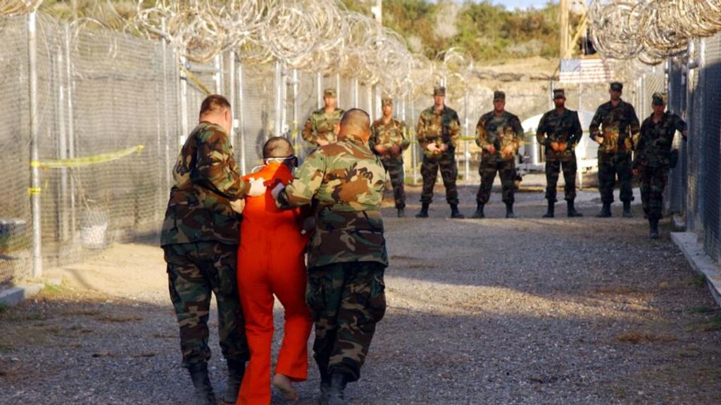 Detained: a prisoner at Guantánamo Bay. Photograph: Petty Officer 1st Class Shane T McCoy/US Navy/Getty