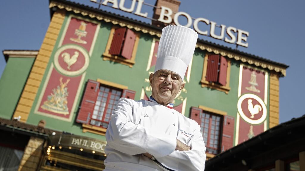 Paul Bocuse poses in 2011 outside his famed Michelin three-star restaurant L’Auberge du Pont de Collonges. File photograph: Laurent Cipriani/AP