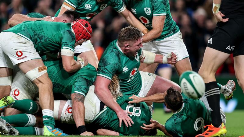 Josh Van der Flier, Garry Ringrose, Hugo Keenan, Tadhg Furlong and Jamison Gibson-Park celebrate with Caelan Doris after his try. Photograph: Dan Sheridan/Inpho