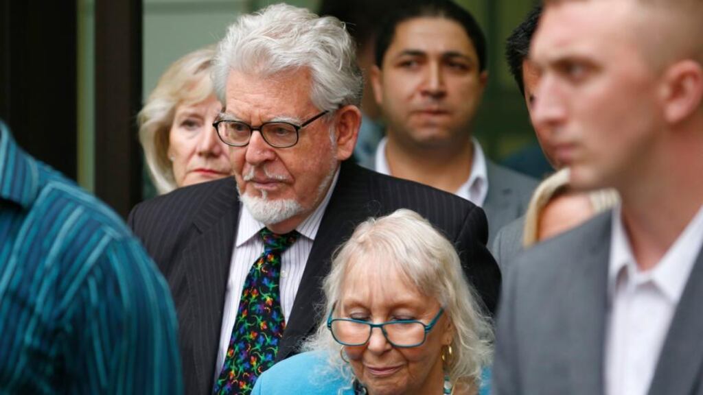 Rolf Harris and his wife Alwen Hughes  leaving Westminster Magistrates Court, in central London today. Photograph: Reuters