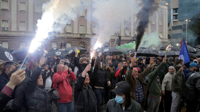 Albanian opposition supporters call for the prime minister Edi Rama’s resignation and early elections. Photograph: Malton Dibra/EPA