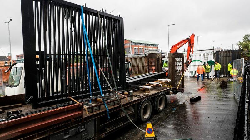 A new security gate is being installed at the Townsend Street interface, which forms part of the peace wall in Belfast. Photograph: Liam McBurney/PA