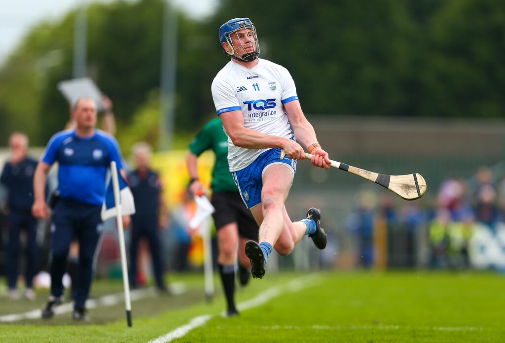 Waterford's Austin Gleeson scores a point from the sideline in the Munster GAA Senior Hurling Championship, Waterford vs Cork. Photograph: Ken Sutton/Inpho