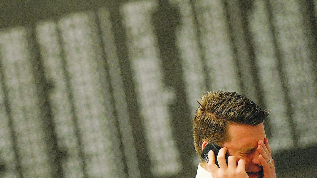 A share trader reacts on first share prices during early trading at the German stock exchange in Frankfurt in 2008. Photograph: Kai Pfaffenbach/Reuters