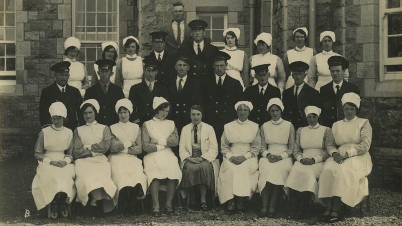 Staff at Ballinasloe District Asylum with Ada English at the front centre (circa 1917). Source: Mattie Ganly. Used with permission