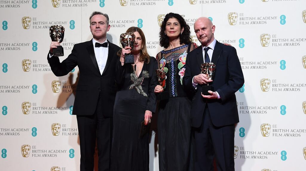 John Crowley, Finola Dwyer, Amanda Posey and Nick Hornby pose in the press room after winning the award for Outstanding British Film for Brooklyn during the 69th Baftas in London, England. Photograph: Andy Rain/EPA
