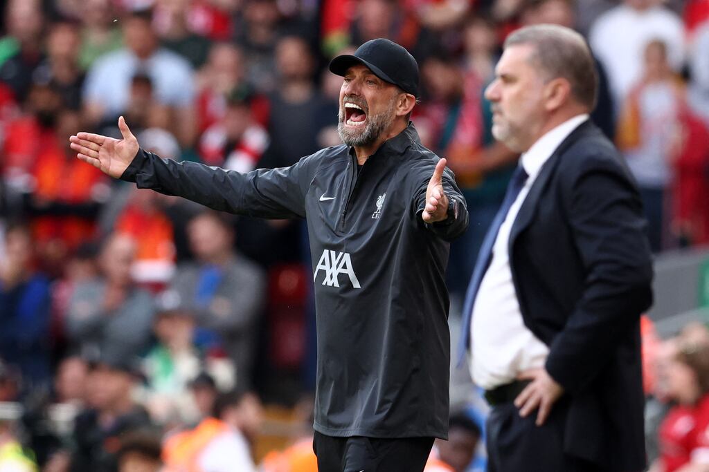 Liverpool manager Jürgen Klopp and Tottenham manager Ange Postecoglou during the match between Liverpool and Spurs at Anfield on Sunday. Photograph: Darren Staples/AFP via Getty Images