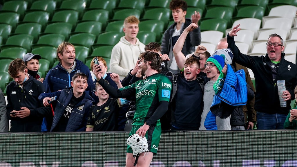 Connacht’s Mack Hansen with fans after the win over Ulster in the United Rugby Championship match at the Aviva Stadium. Photograph: James Crombie/Inpho
