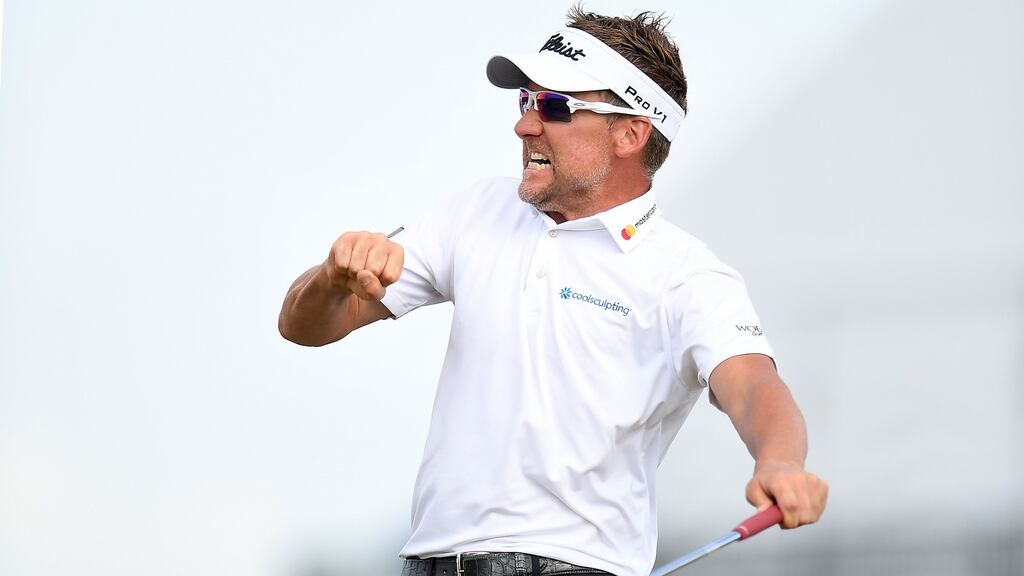 Ian Poulter celebrates victory in the Houston Open, after a play-off. Photograph: Stacy Revere/Getty