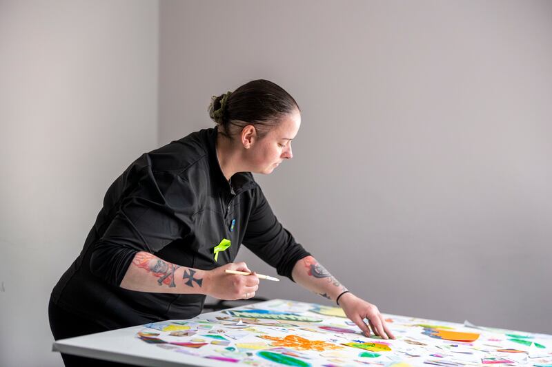 Susan Reynolds, who now acts as a peer-support volunteer with the housing charity Hail, facilitating an art workshop at the
Carmelite Community Centre, Aungier Street, Dublin. Photograph: Tom Honan