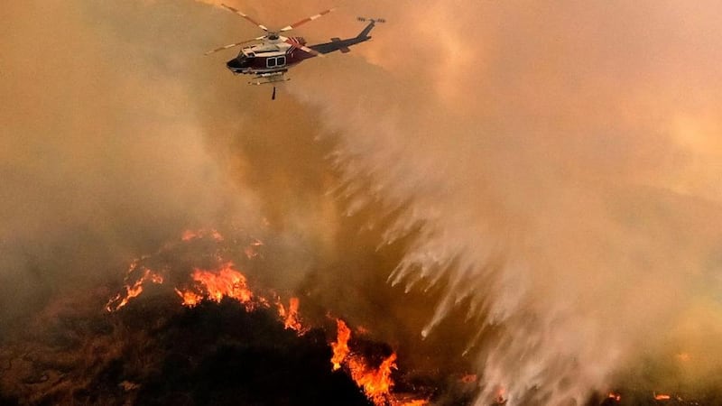 Ferocious weather: the Holy Fire at Lake Elsinore, California. Photograph: Ringo Chiu/AFP/Getty Images