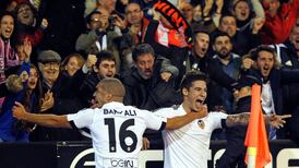 Valencia rescue point against Barcelona as Neville watches on